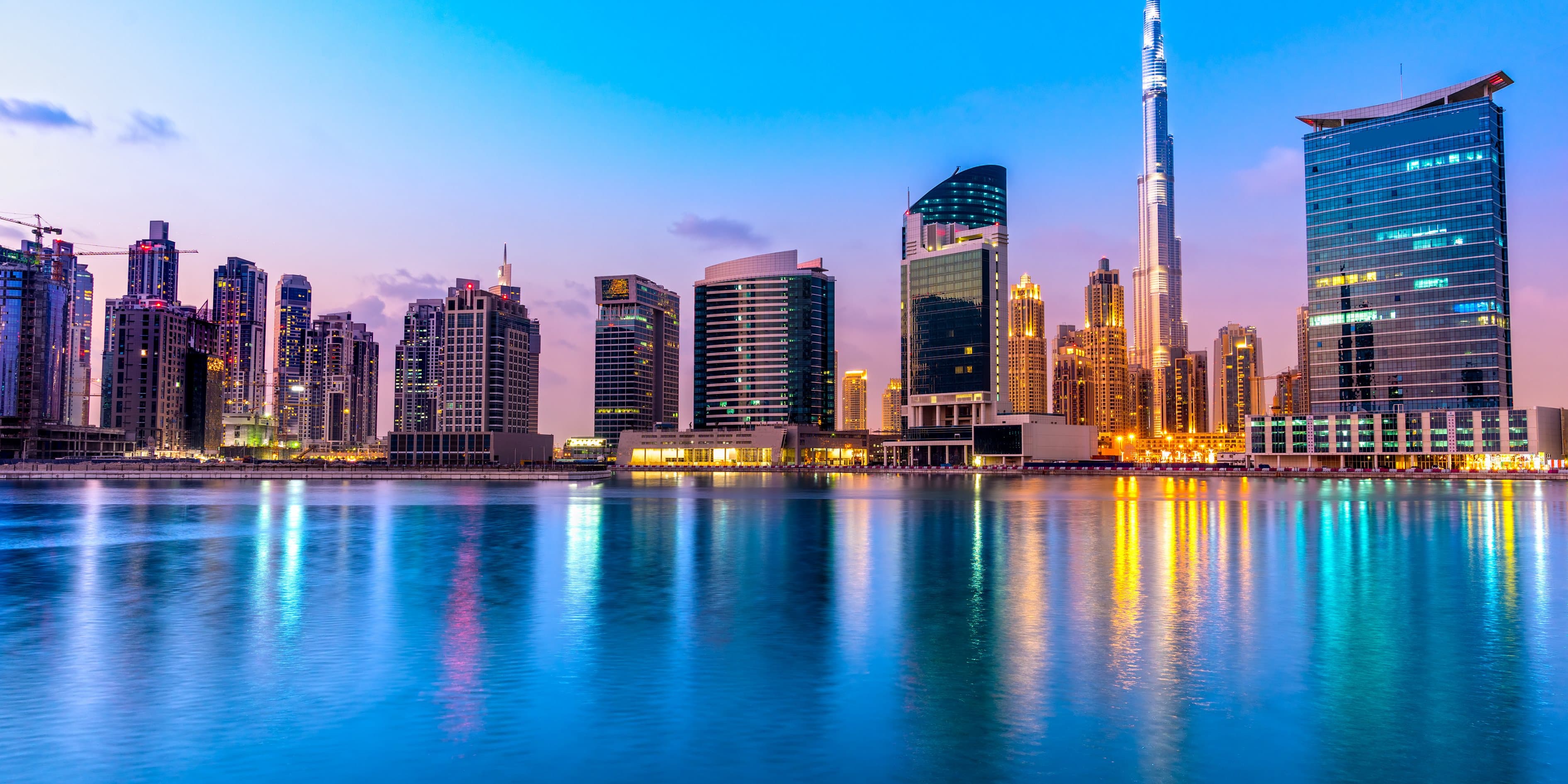 Dubai skyline at dusk, featuring the Burj Khalifa